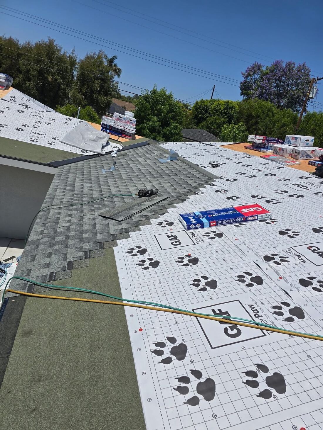 New GAF Timberline HD shingle roof installation over synthetic underlayment